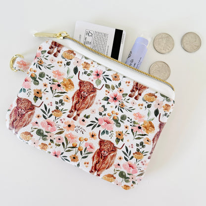 white highland cow coin purse made from vegan leather. 
