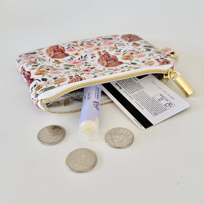 white highland cow coin purse made from vegan leather. 
