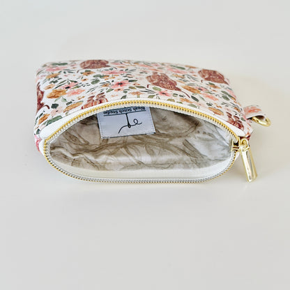 white highland cow coin purse made from vegan leather. 