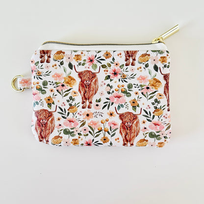 white highland cow coin purse made from vegan leather. 