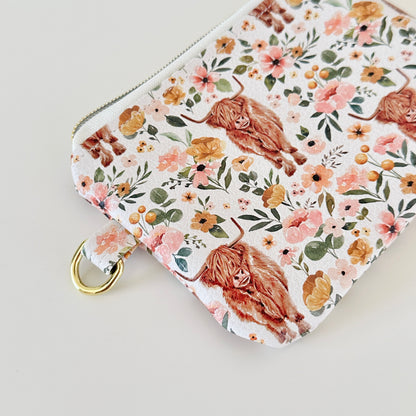 white highland cow coin purse made from vegan leather. 