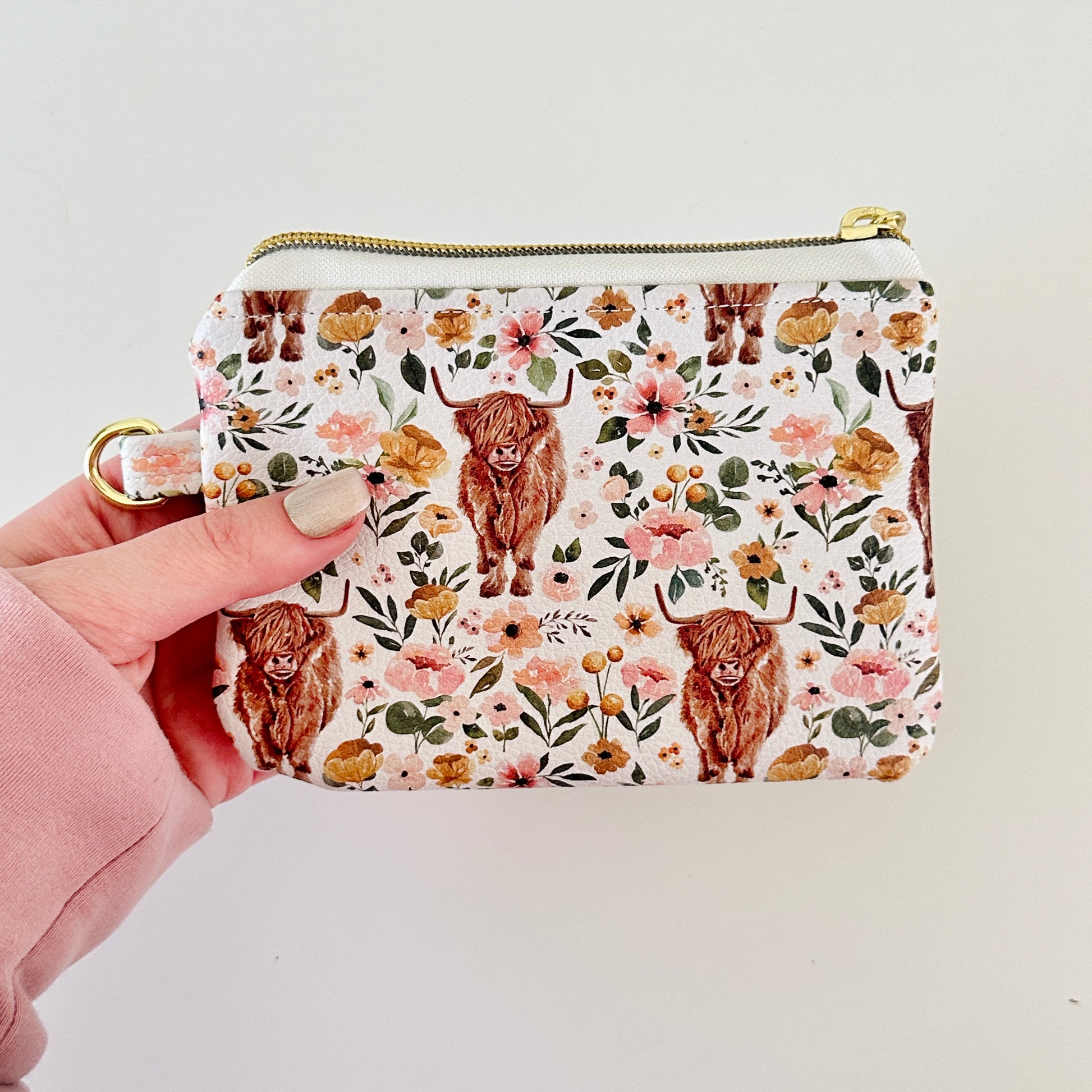white highland cow coin purse made from vegan leather. 