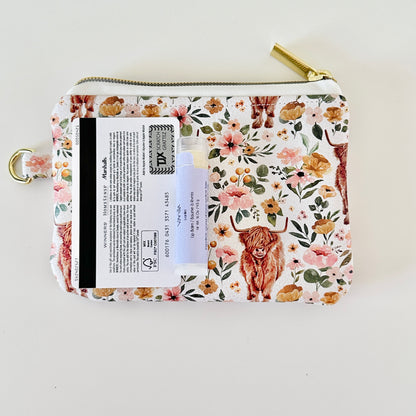 white highland cow coin purse made from vegan leather. 