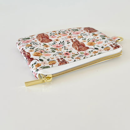 white highland cow coin purse made from vegan leather. 