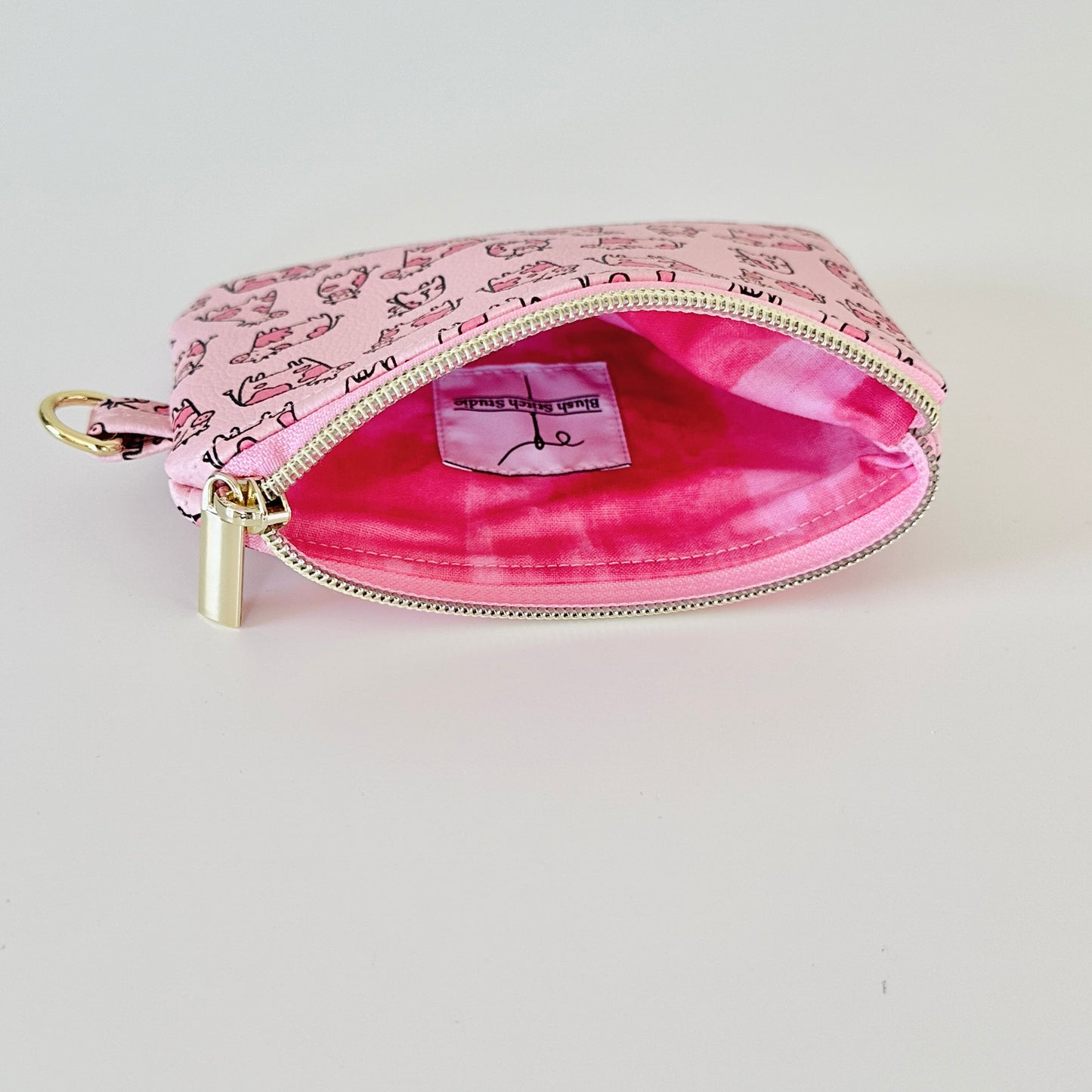 pink cow coin purse made from vegan leather