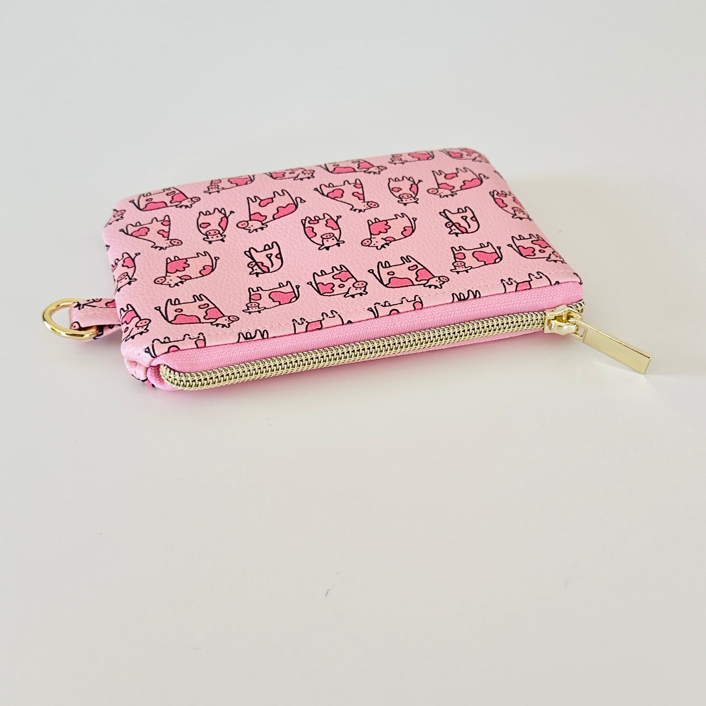 pink cow coin purse made from vegan leather