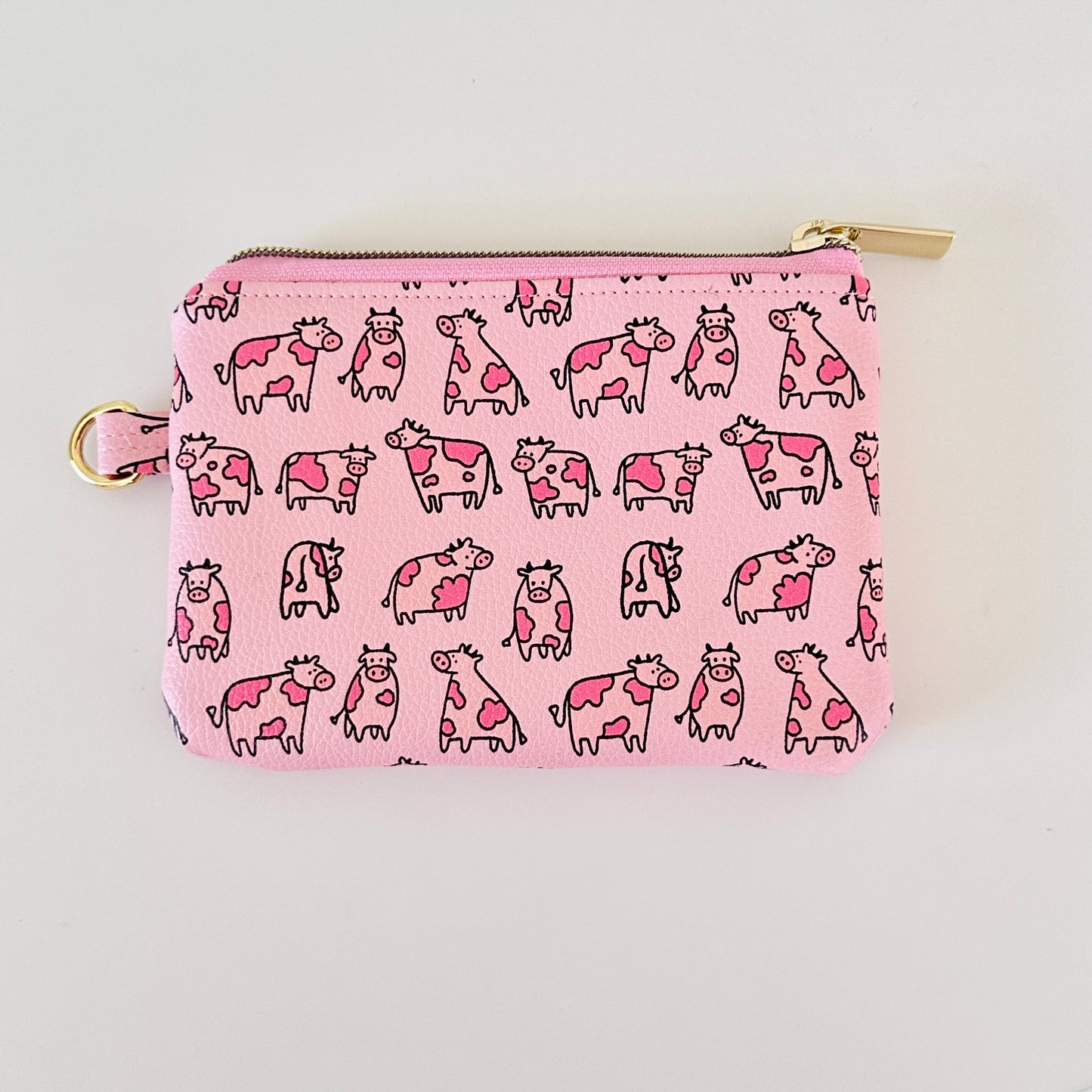 pink cow coin purse made from vegan leather