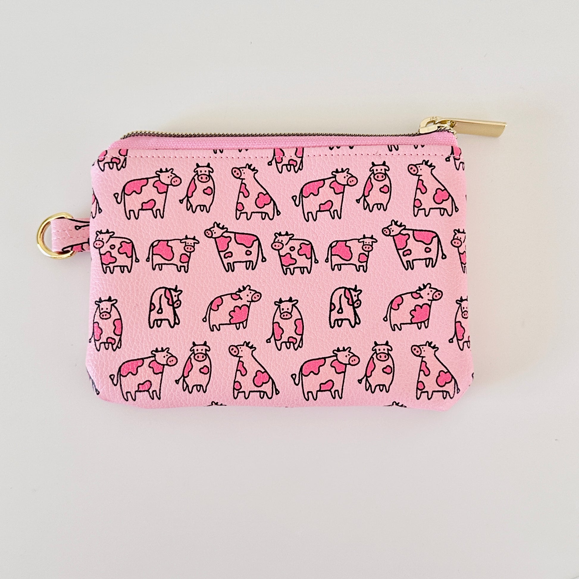 pink cow coin purse made from vegan leather
