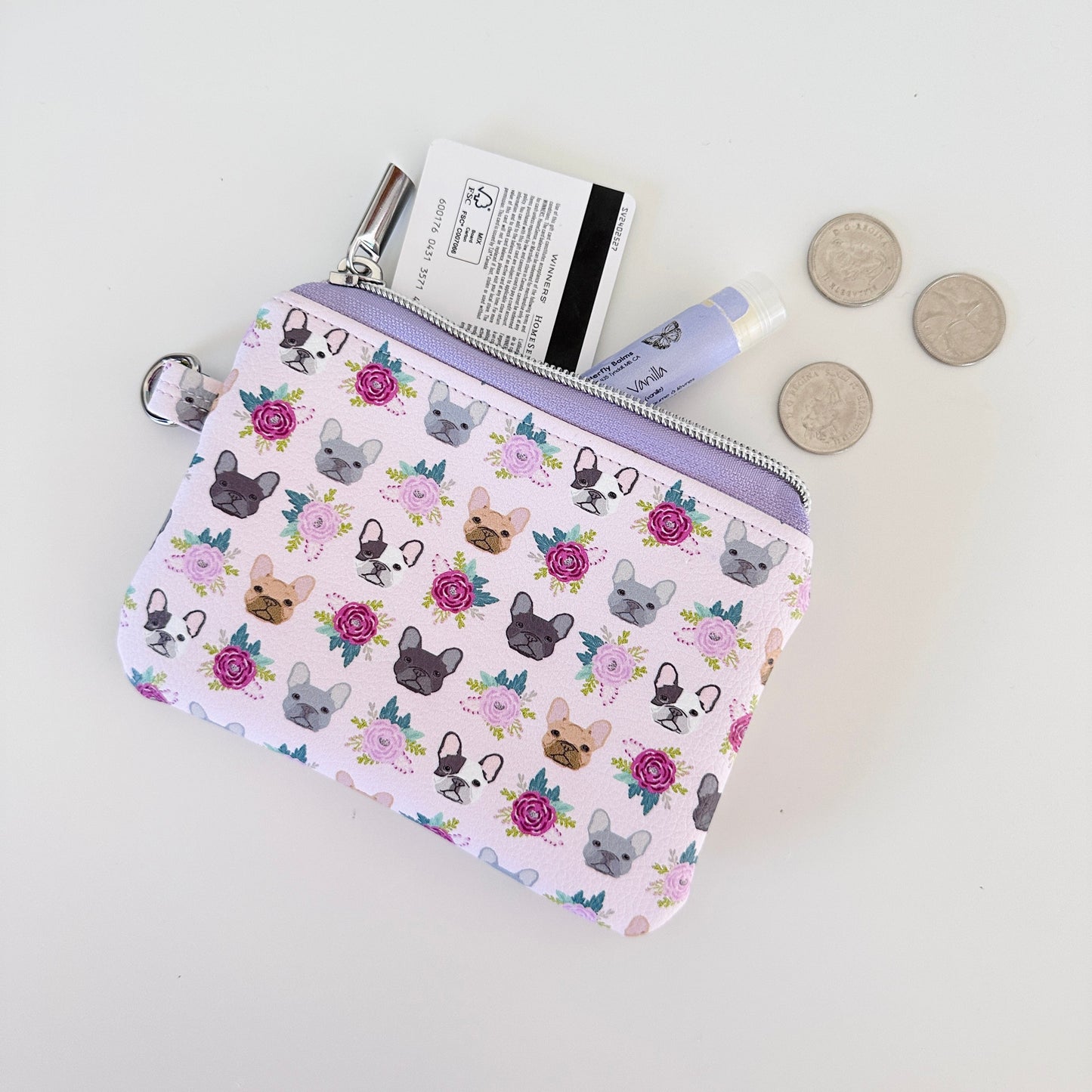 Small pouch with dog pattern on a white background