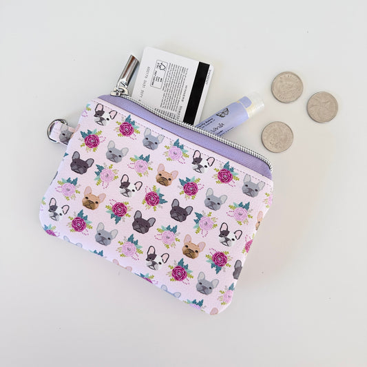 Small pouch with dog pattern on a white background