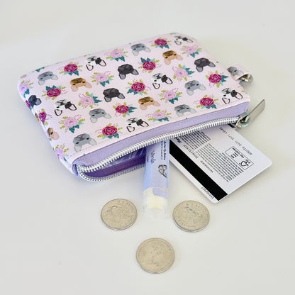 Small pouch with dog pattern on a white background