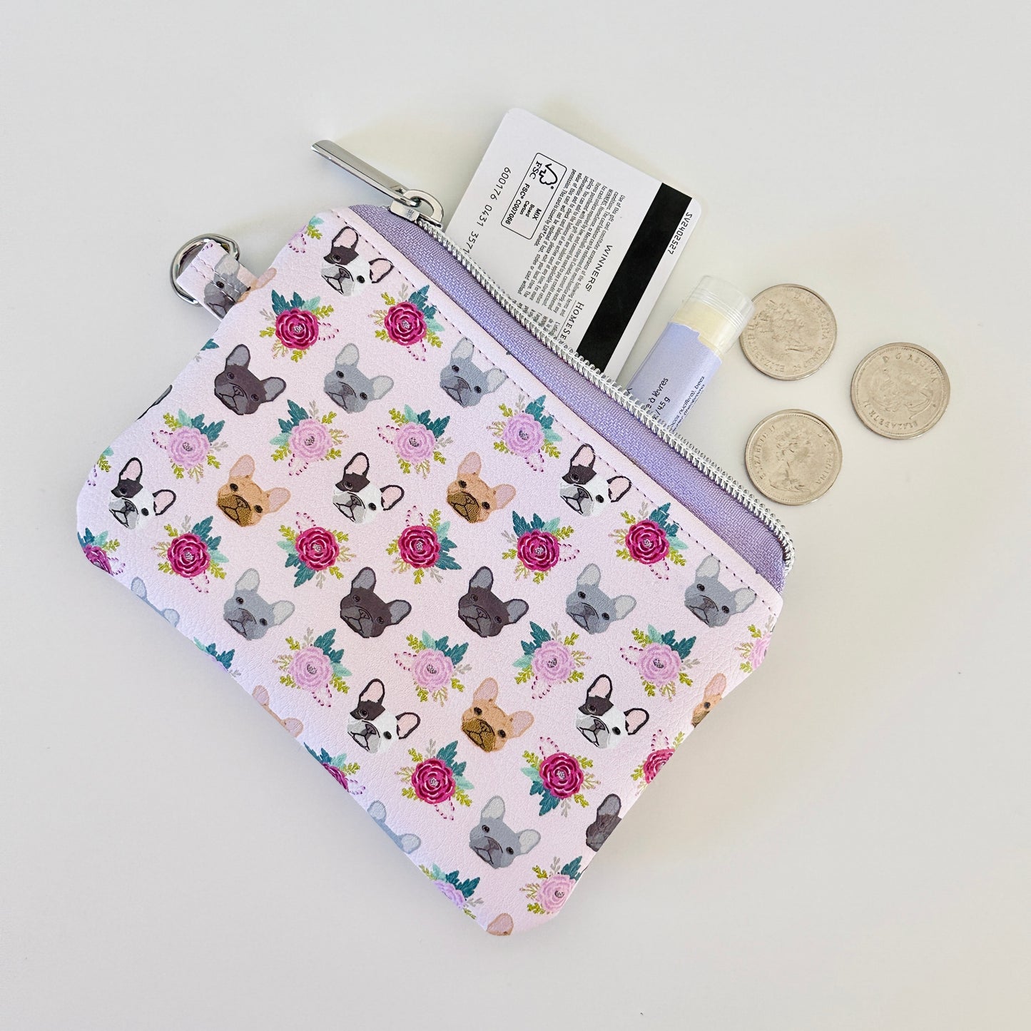 Small pouch with dog pattern on a white background