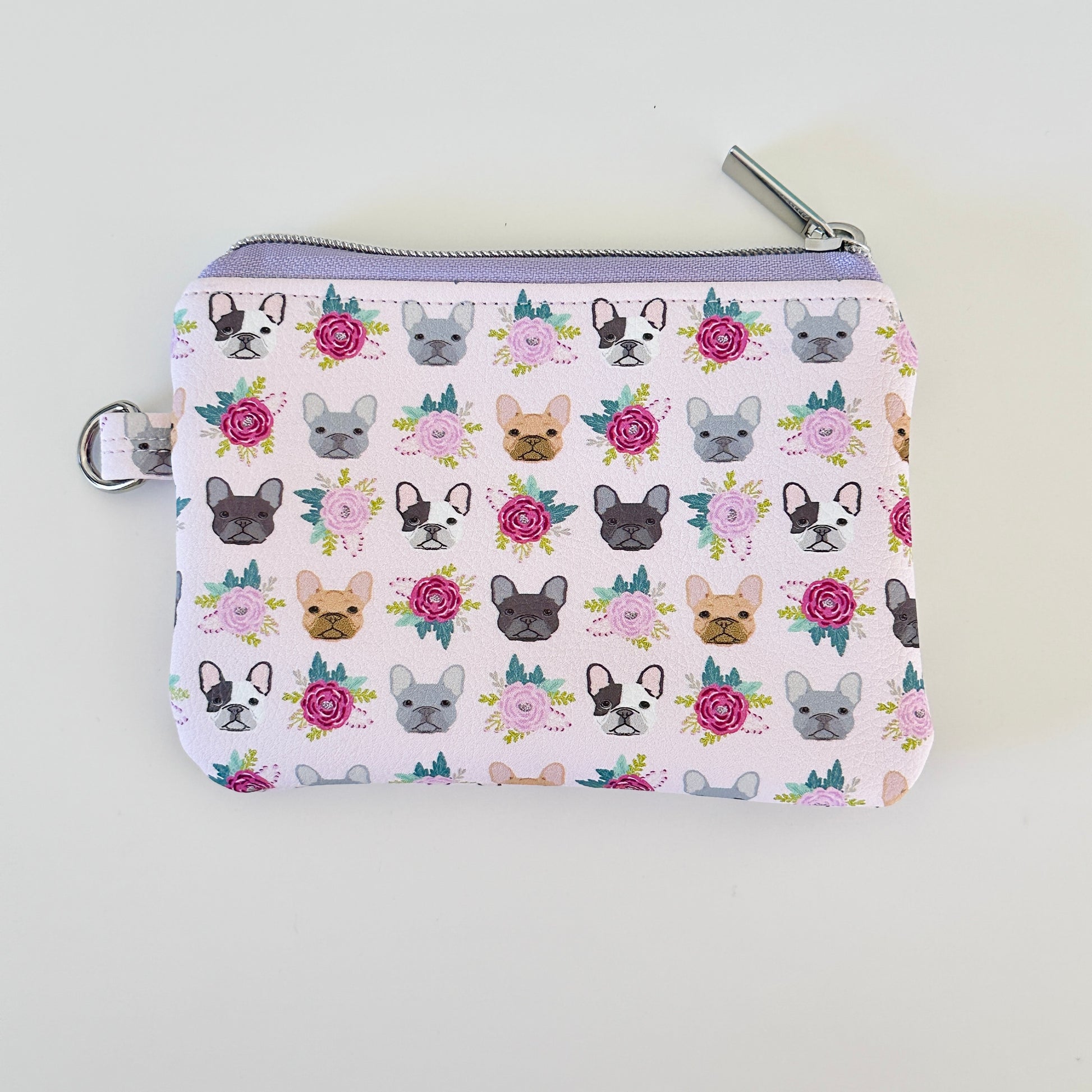 Small pouch with dog pattern on a white background