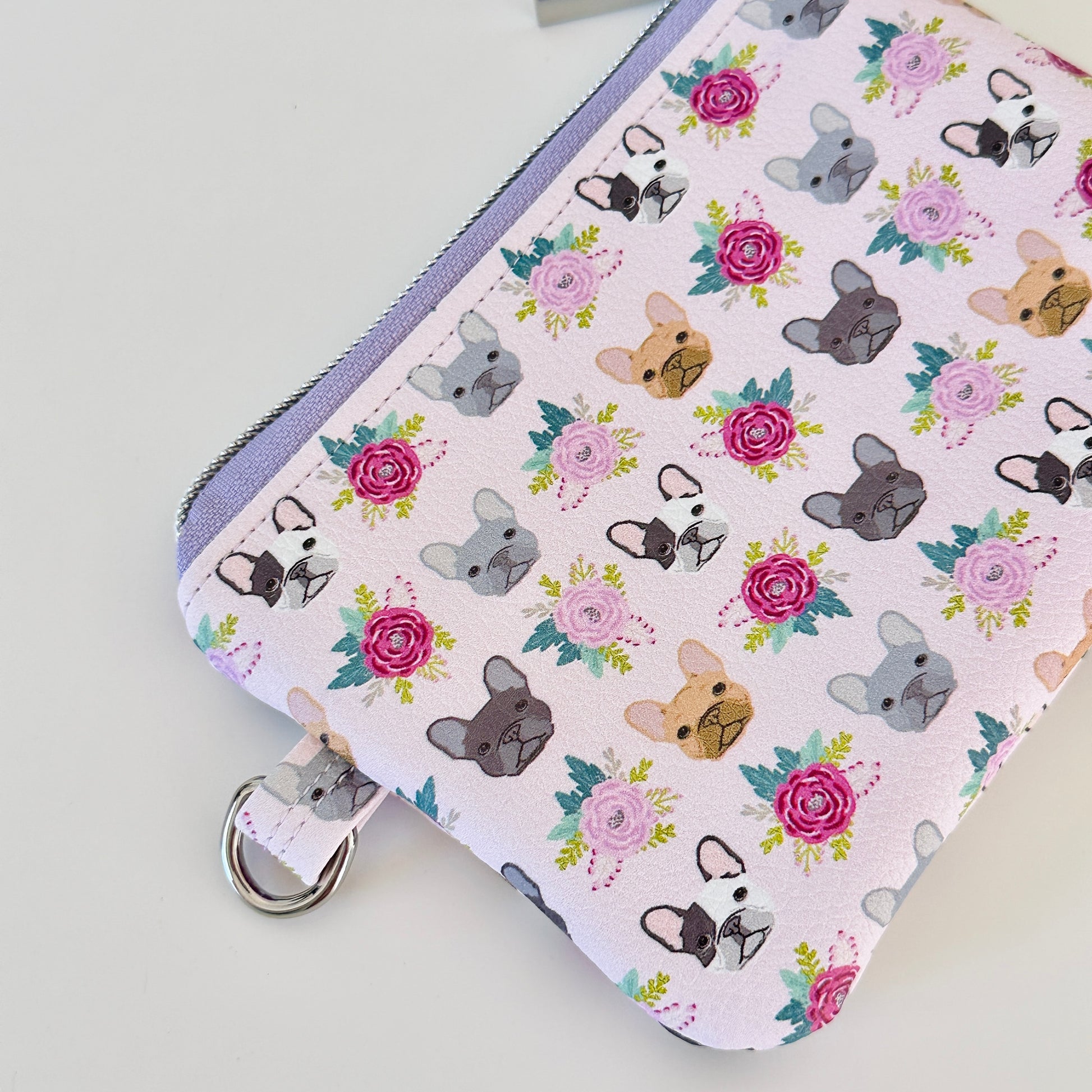 Small pouch with dog pattern on a white background