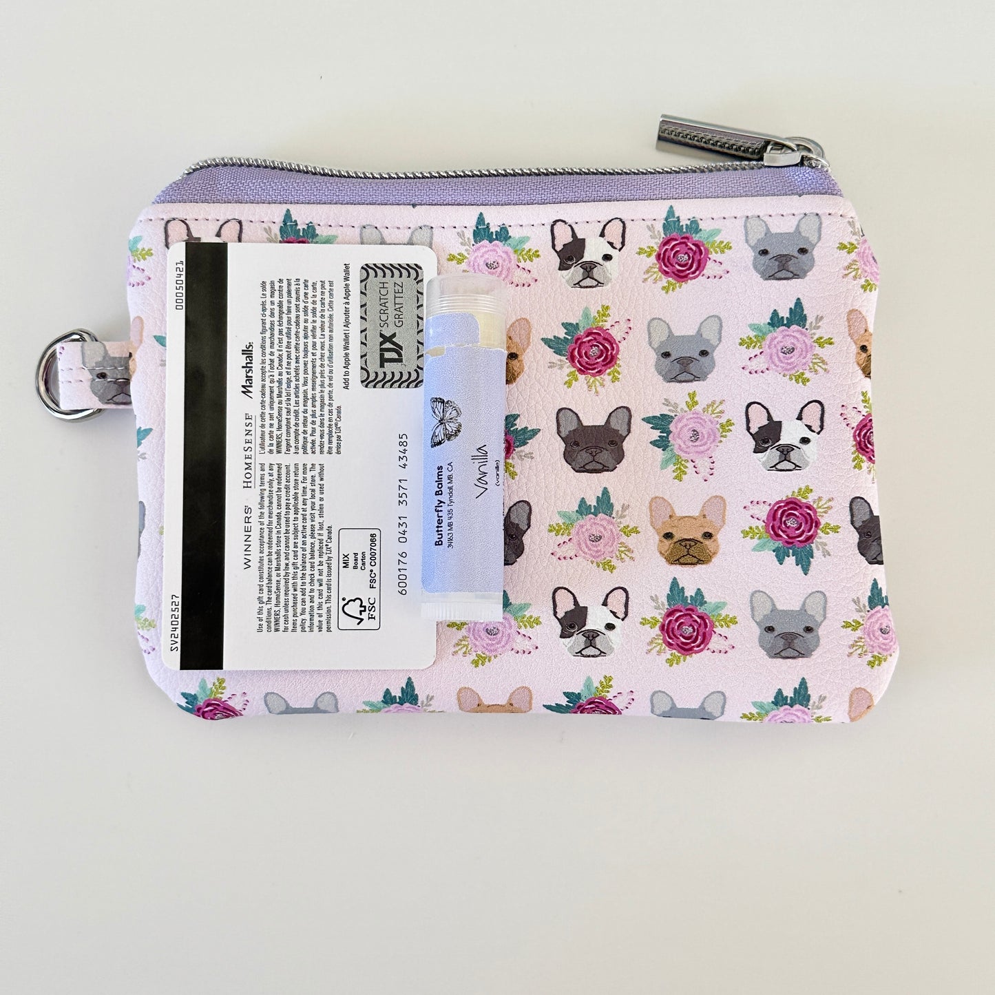 Small pouch with dog pattern on a white background