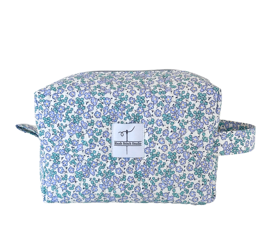 Blue Floral Quilted Makeup bag. Made in Canada