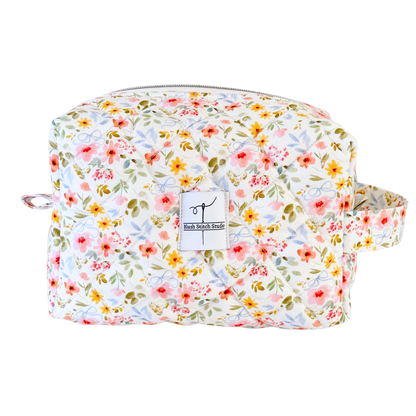 white floral quilted makeup cosmetic bag. made in canada