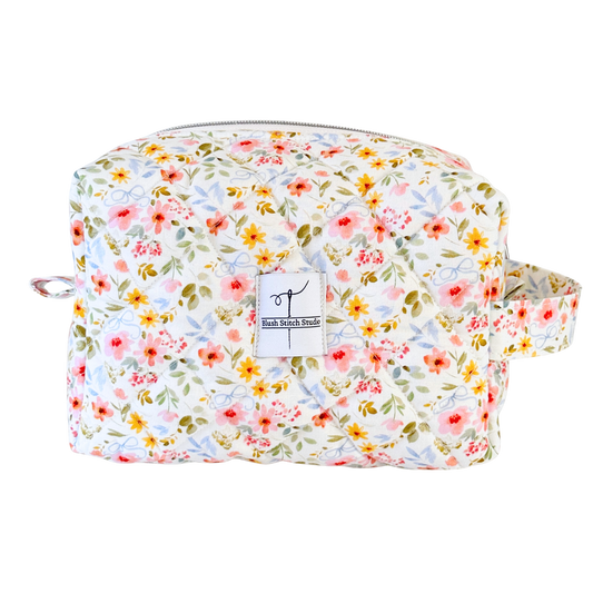 white floral quilted makeup cosmetic bag. made in canada