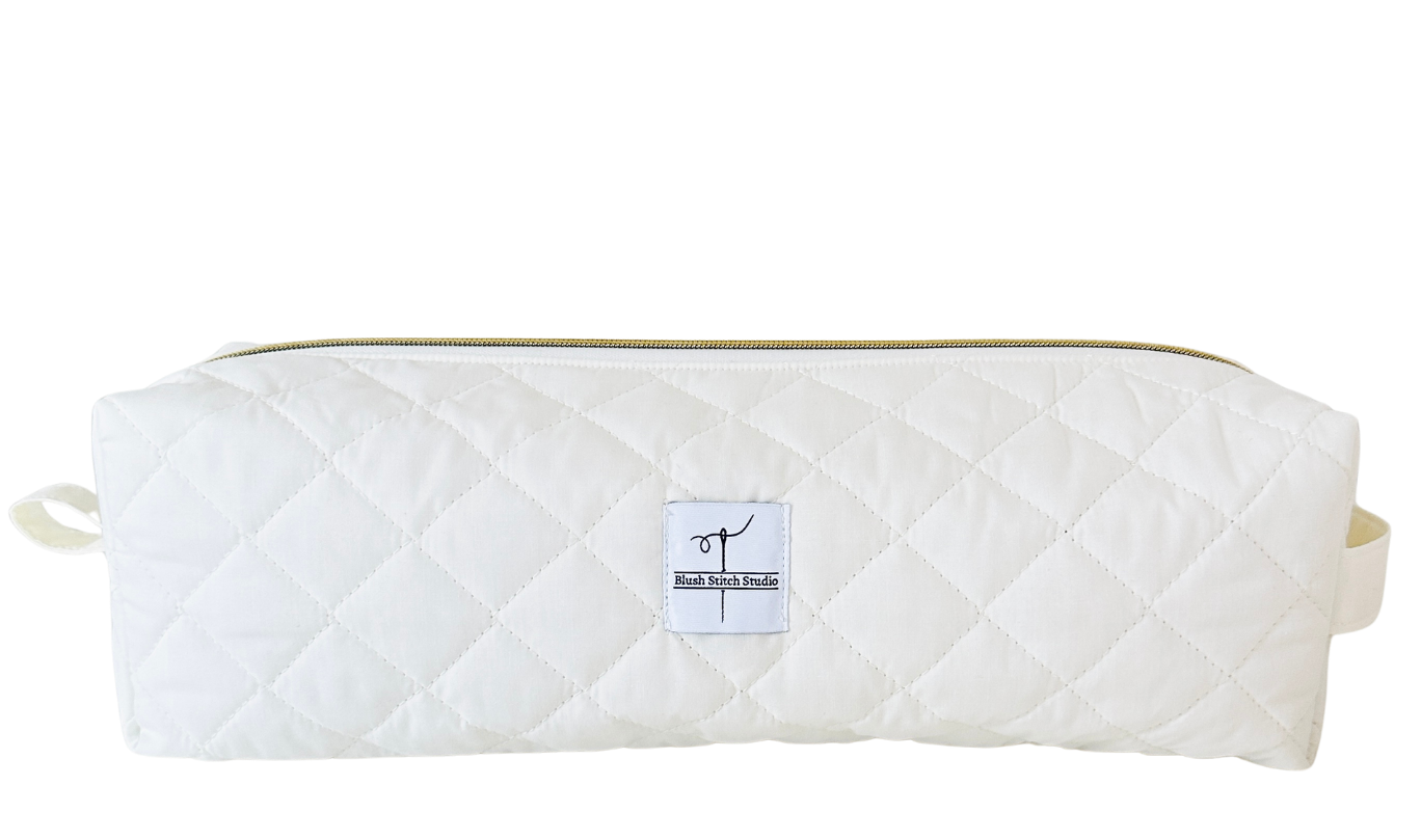 Ivory quilted hair tool bag