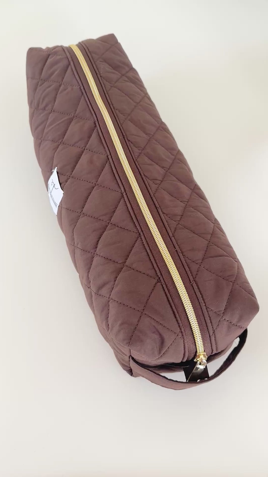 brown quilted hair tool bag