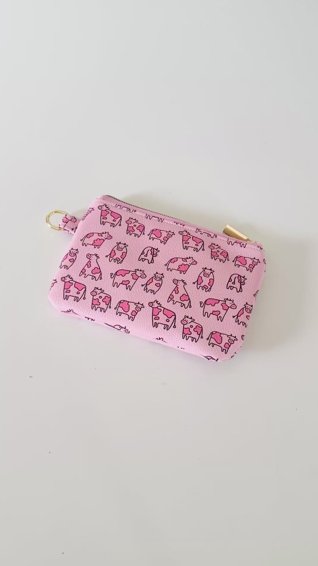 pink cow coin purse made from vegan leather
