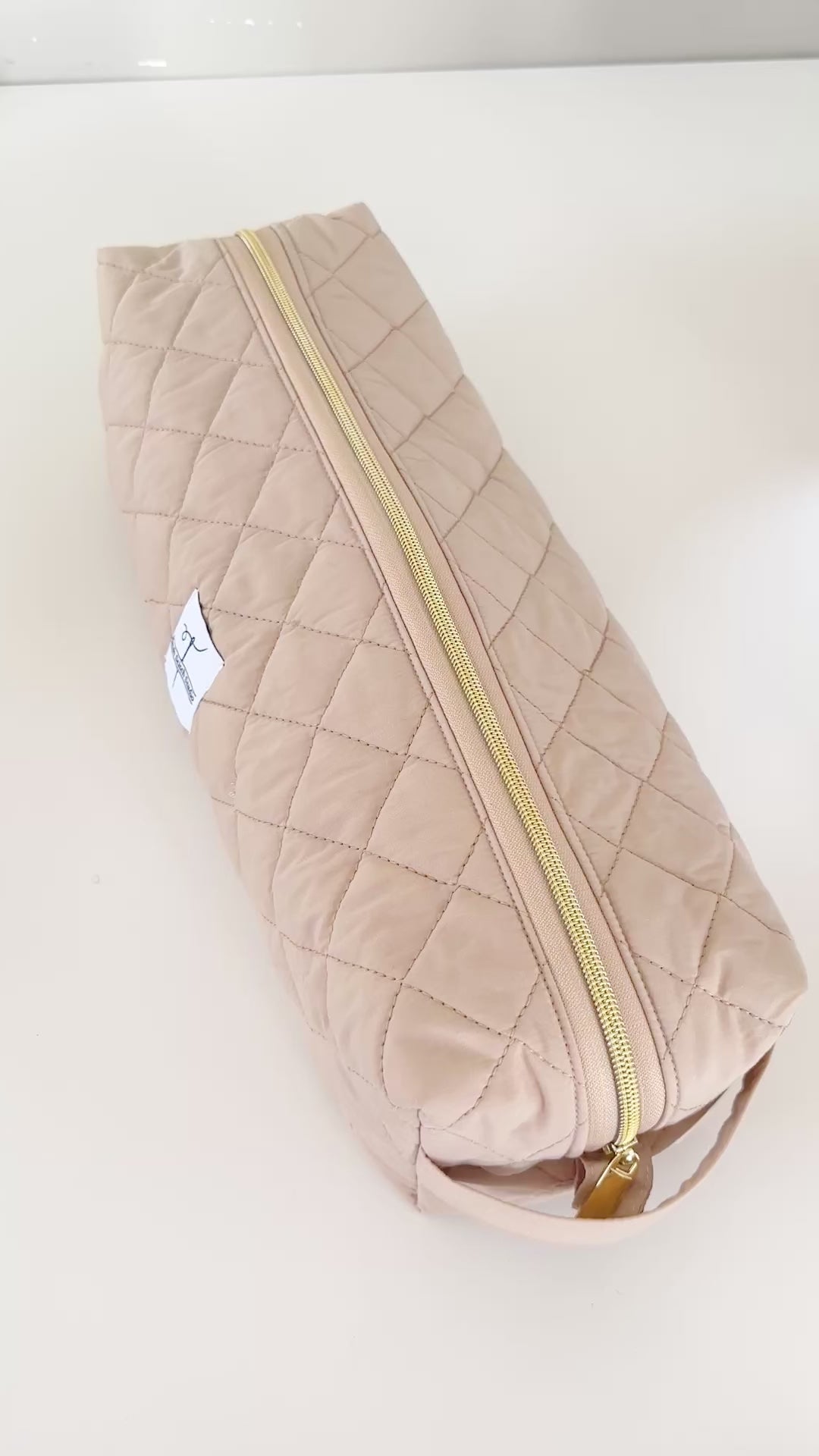 beige hair tool bag