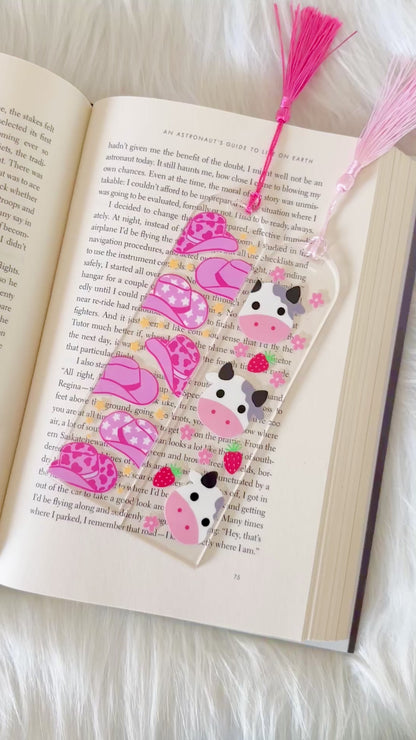 Set of floral patterned keychains with gold clasps on a white background