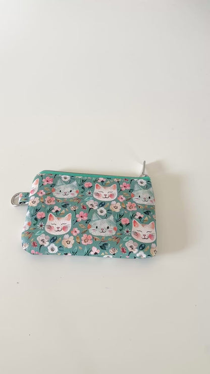coin purse with cat and floral pattern on a white background