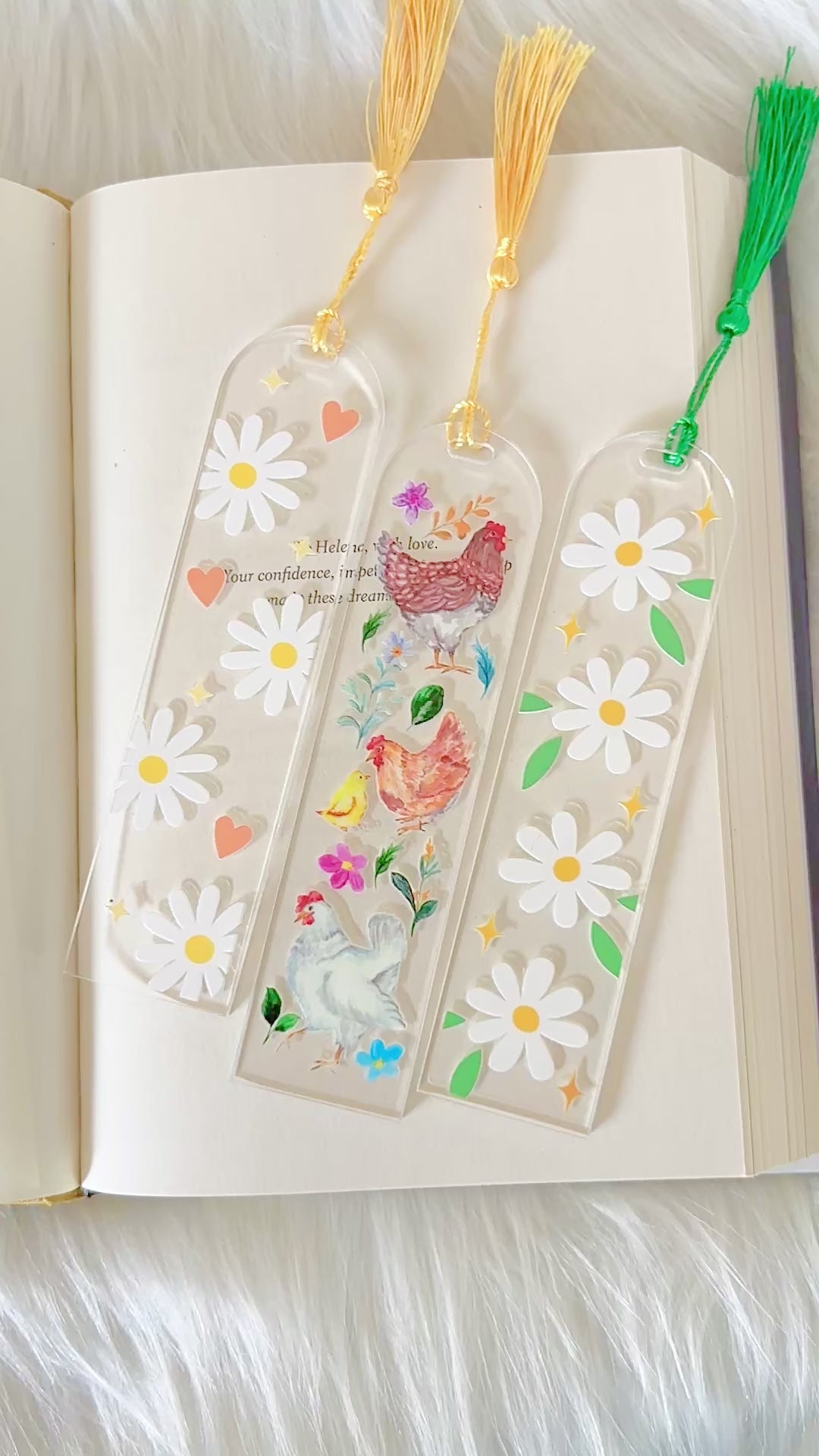 flower and chicken bookmarks on an open book