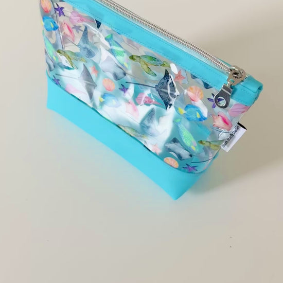 clear makeup bag with a tropical fish and stingray pattern 