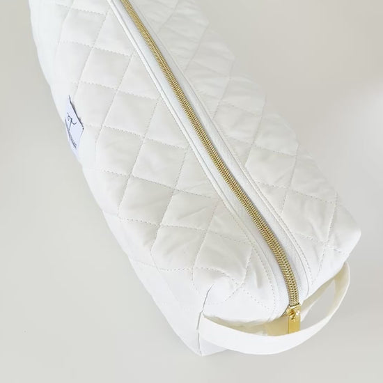 Ivory quilted hair tool bag