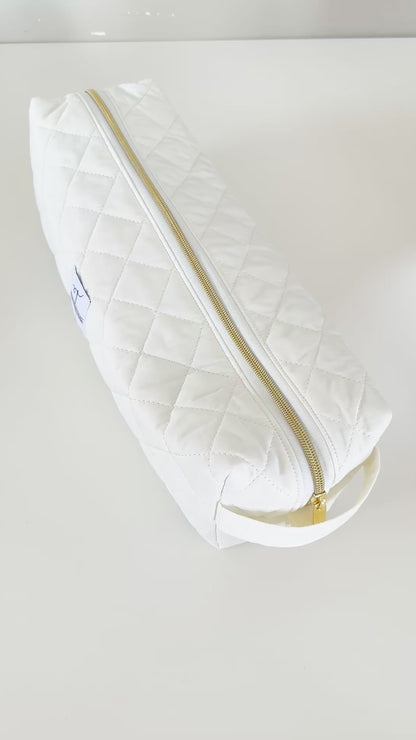 Ivory quilted hair tool bag