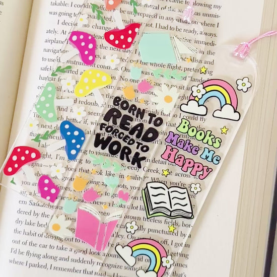 Colorful bookmark with motivational text on an open book