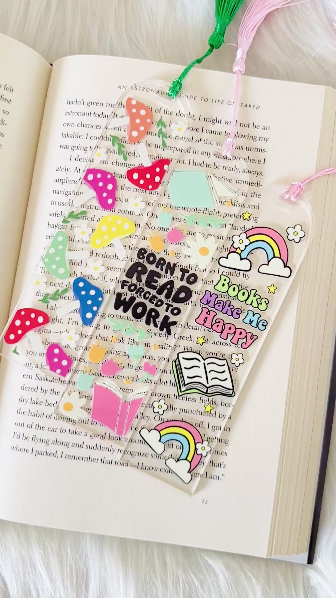 Colorful bookmark with motivational text on an open book