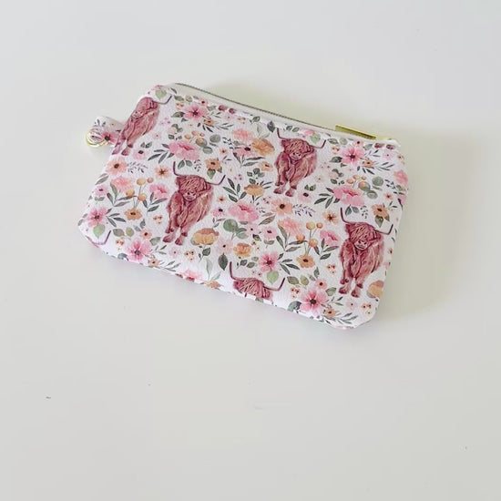 white highland cow coin purse made from vegan leather. 