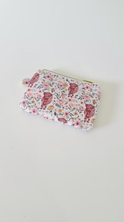 white highland cow coin purse made from vegan leather. 