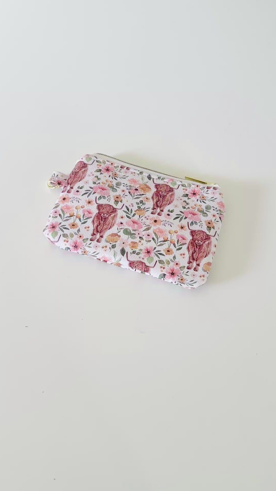 white highland cow coin purse made from vegan leather. 