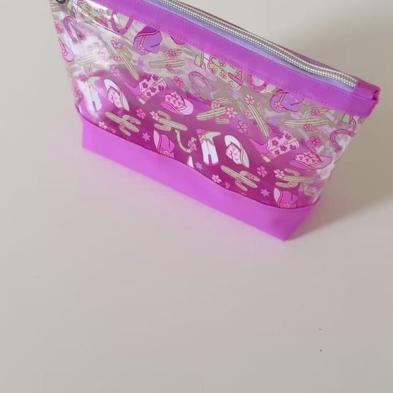 clear cosmetic makeup bag with a cowgirl pattern 