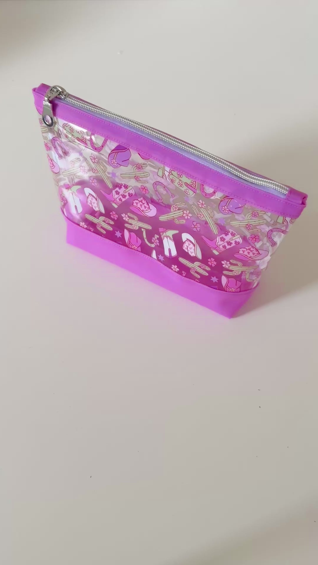 clear cosmetic makeup bag with a cowgirl pattern 