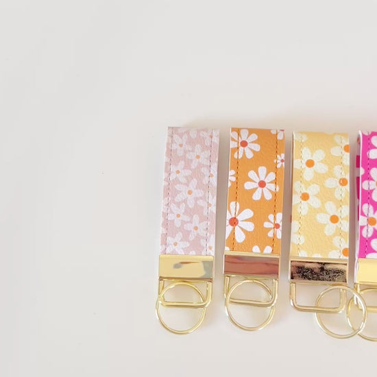 daisy floral pattern keychains made from vegan leather 
