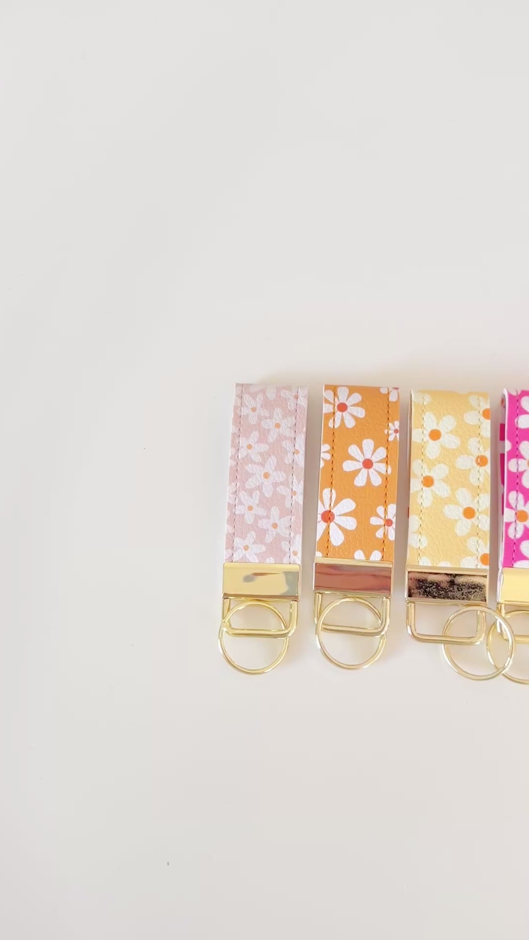 daisy floral pattern keychains made from vegan leather 