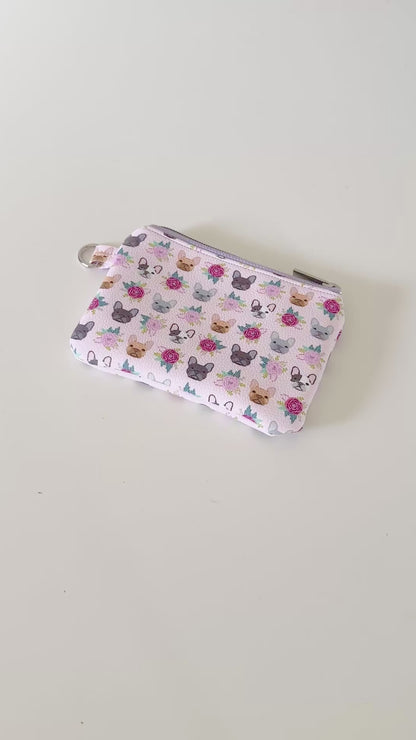 Small pouch with dog pattern on a white background