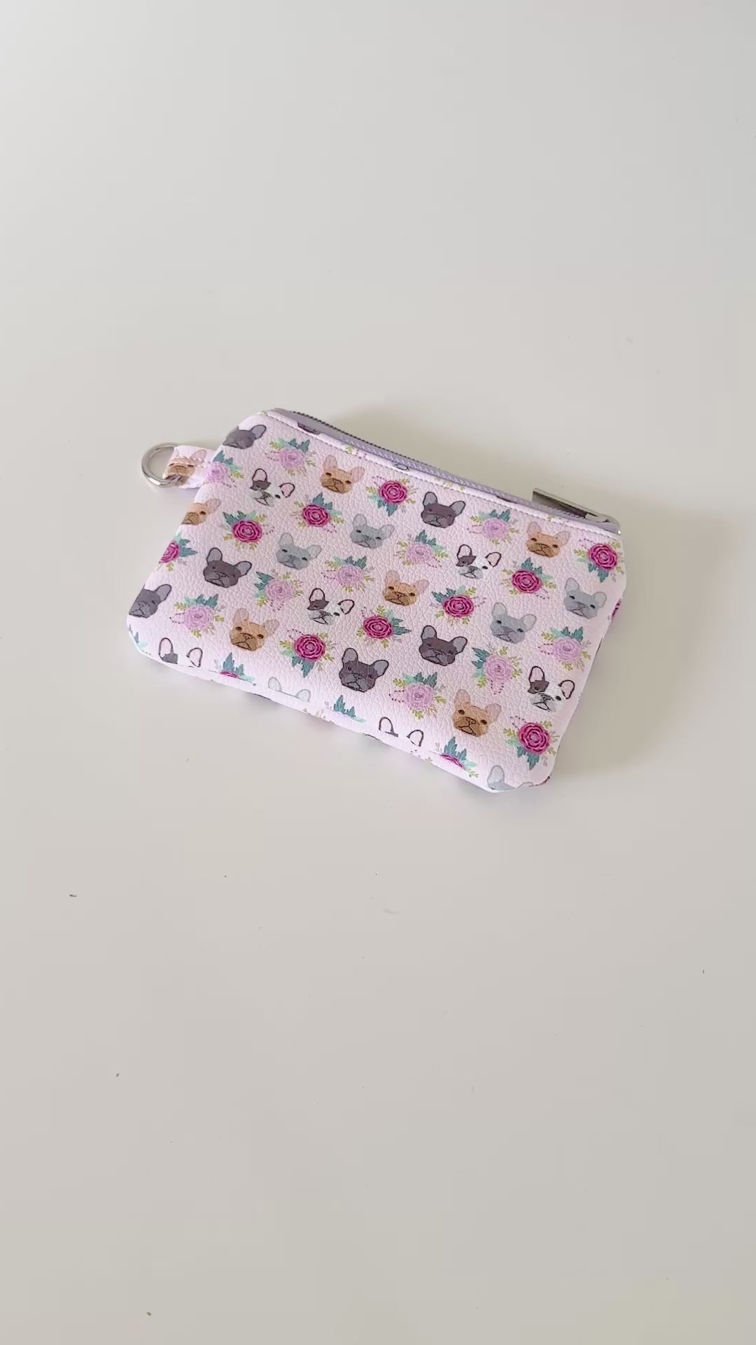 Small pouch with dog pattern on a white background